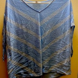 This is a medium tie sleeve shirt. Worn maybe 2 times